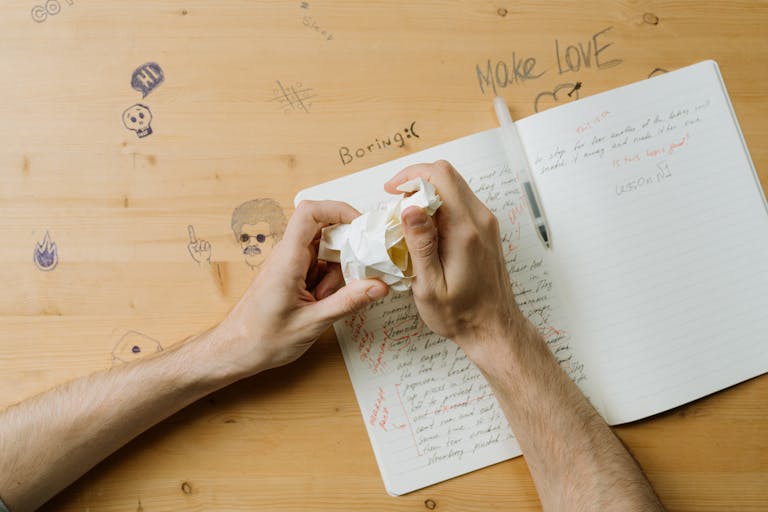 Person Holding Crumpled Paper